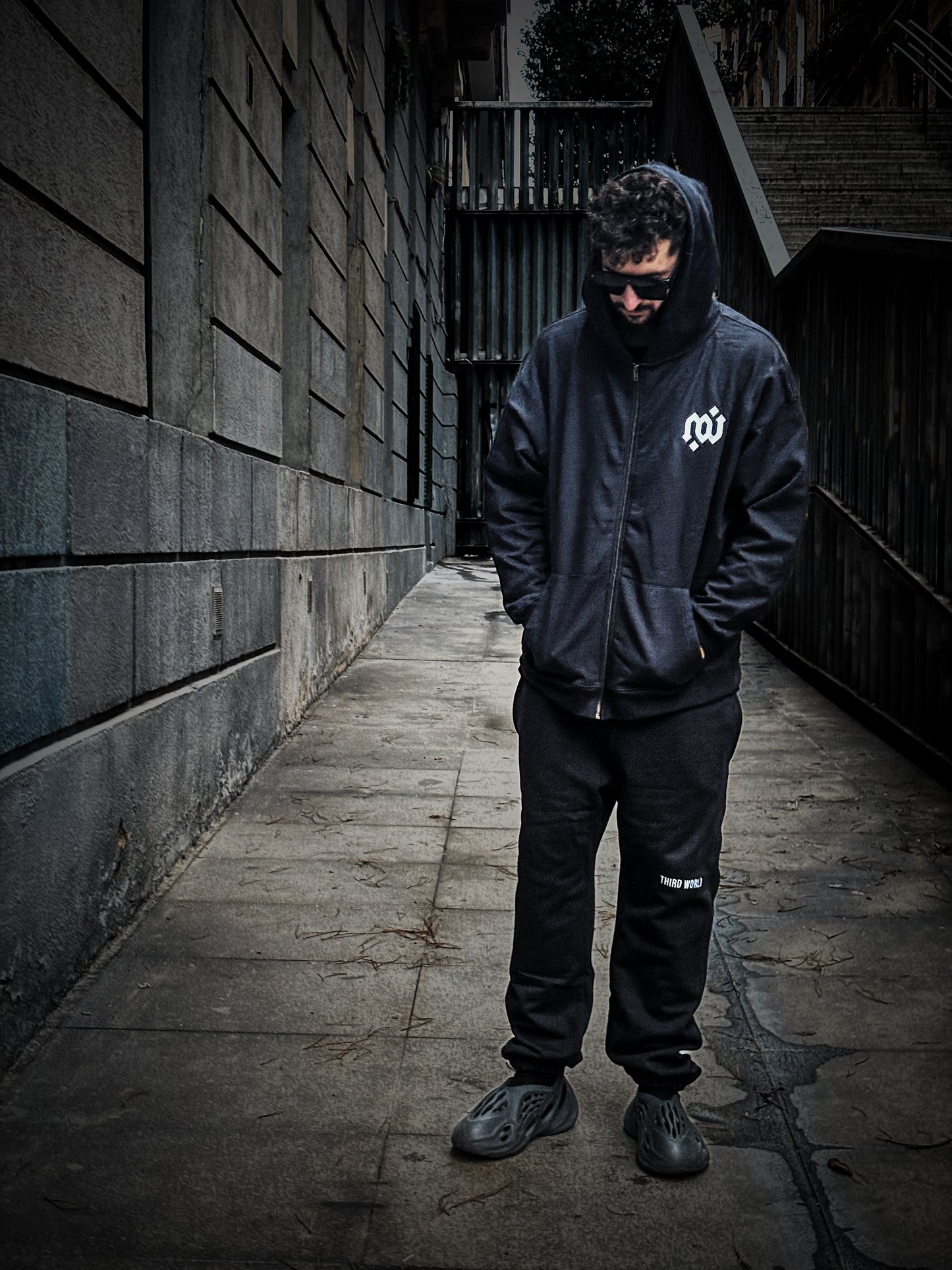 Standard Sweatpant Sample II - White Typography. “S” Patch: Upper Left Knee