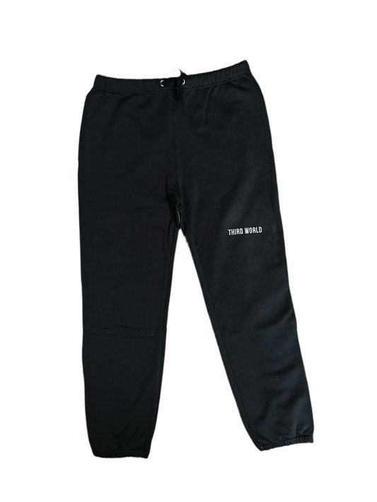 Standard Sweatpant Sample II - White Typography. “S” Patch: Upper Left Knee